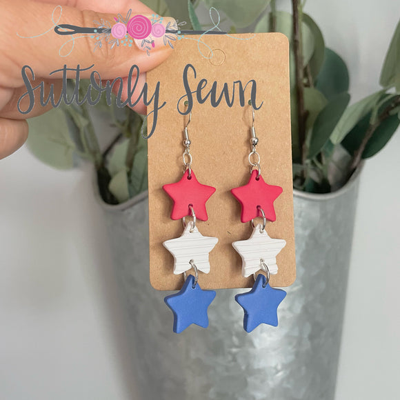 Triple Star Dangle earrings